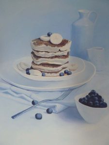 pancakes and fruit on a plate